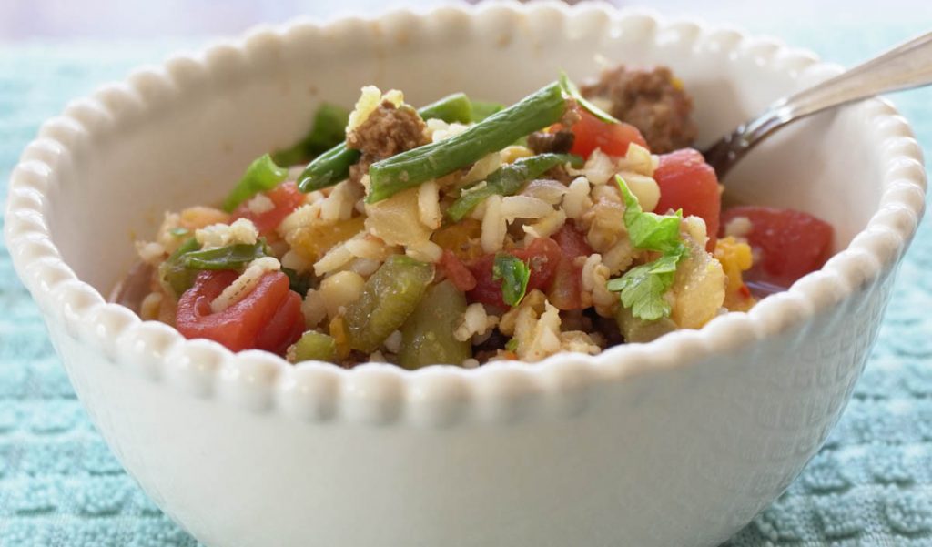 Slow Cooker Hamburger Veggie Soup
in a white bowl with spoon