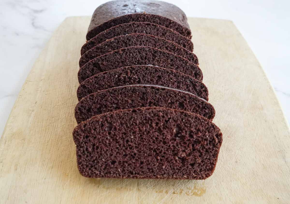 slices of low carb chocolate quick bread on cutting board.