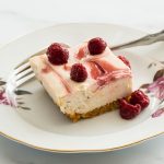 low carb raspberry swirl cheesecake on plate