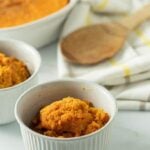 low carb carrot cassreole in a white ramekin cup