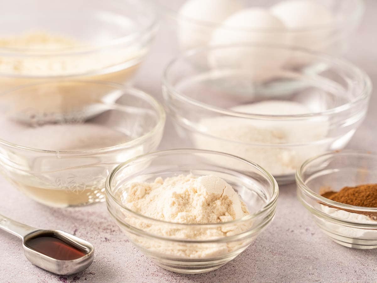 almond flour, sugar substitute, eggs, vanilla, coconut oil, cinnamon in small glass bowls