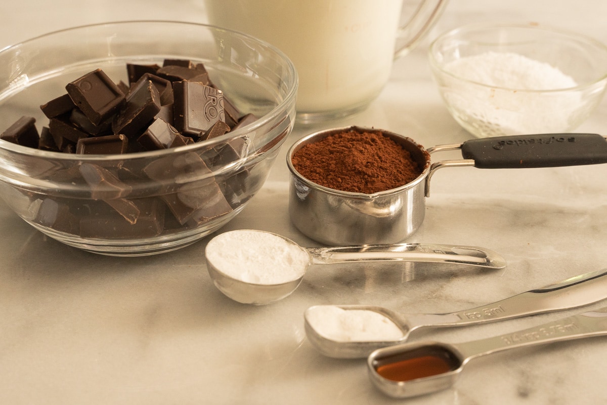 chopped chocolate, cocoa powder, heavy cream, vanilla extract, arrowroot power, sugar substitute