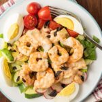 shrimp louie salad on white plate