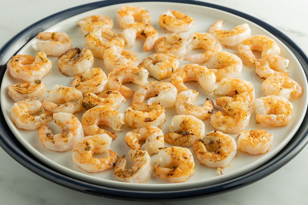 grilled shrimp on white platter