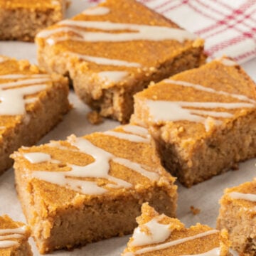 keto spice cake with glaze and red and white napkin