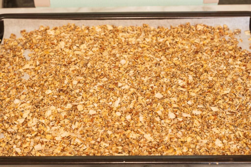 keto nut granola on baking sheet.