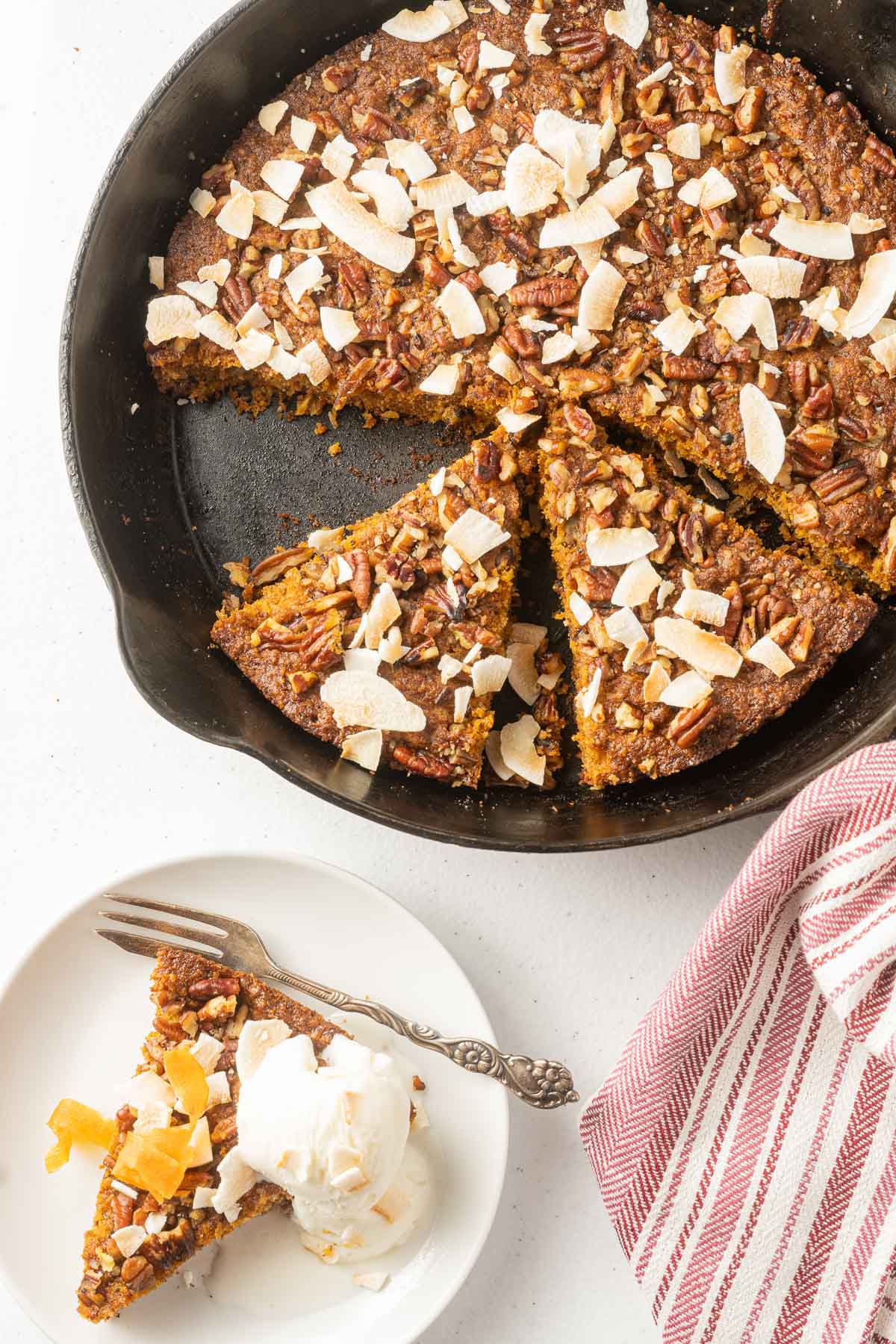 cast iron carrot cake, slice of cake on plate.