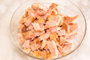 bowl of chopped cooked ham.