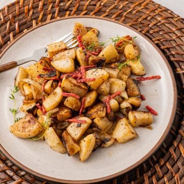 keto fried turnips on wicker plate.