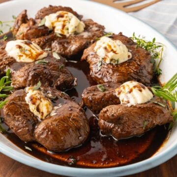 filet medallions on white platter.