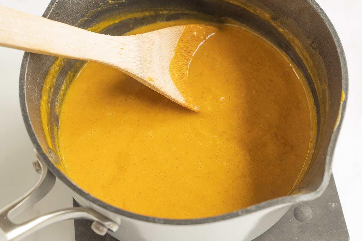 Pumpkin puree in saucepan.