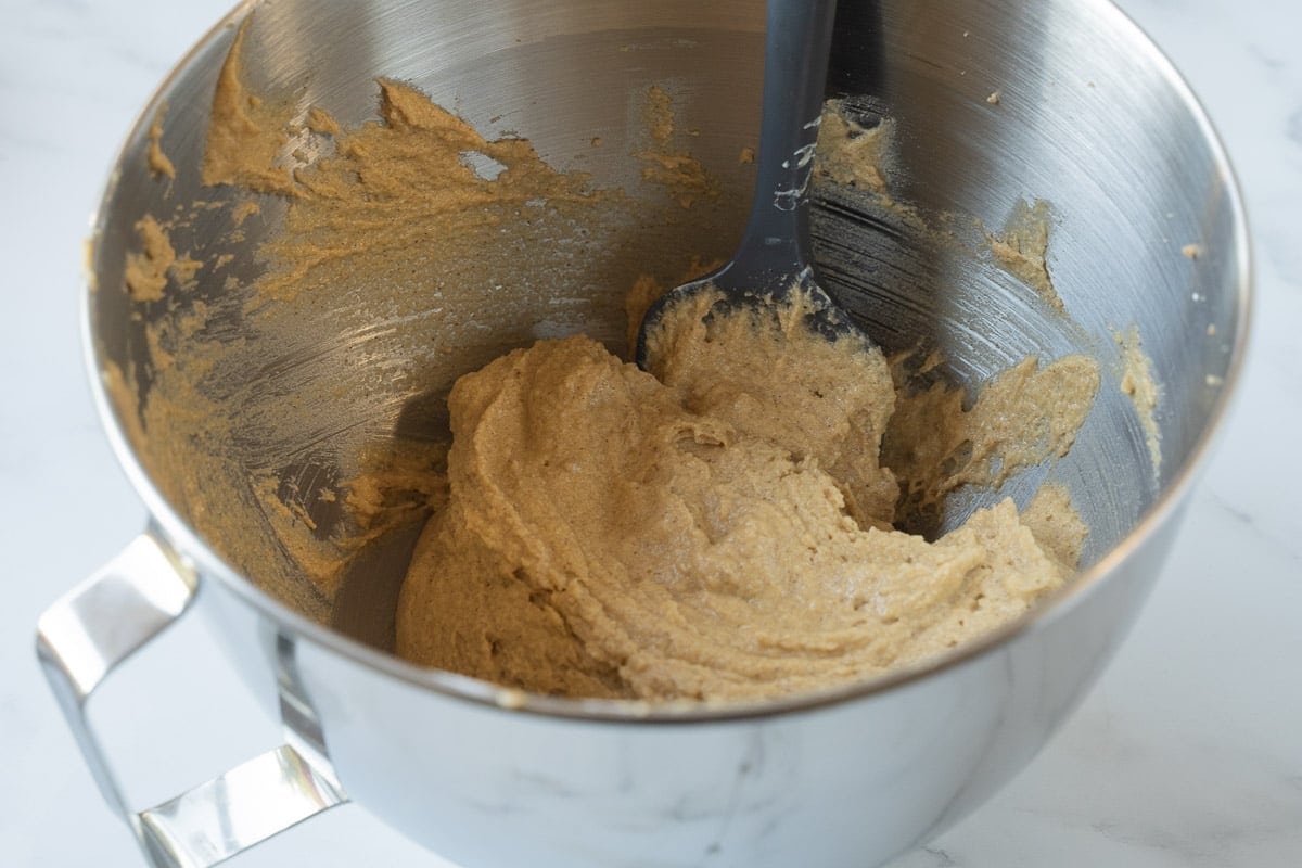 Apple cake batter in mixing bowl.