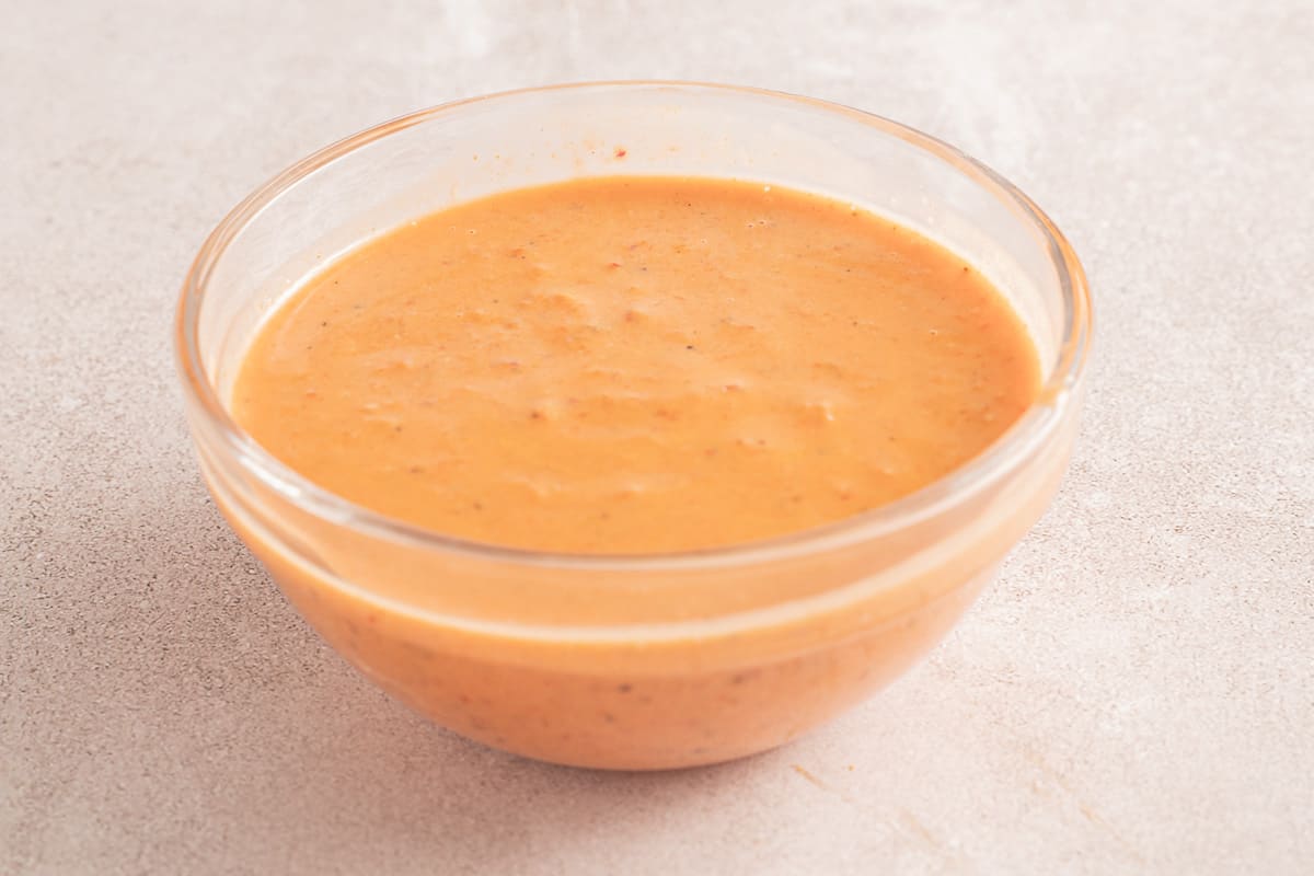 spicy aioli sauce in glass bowl.