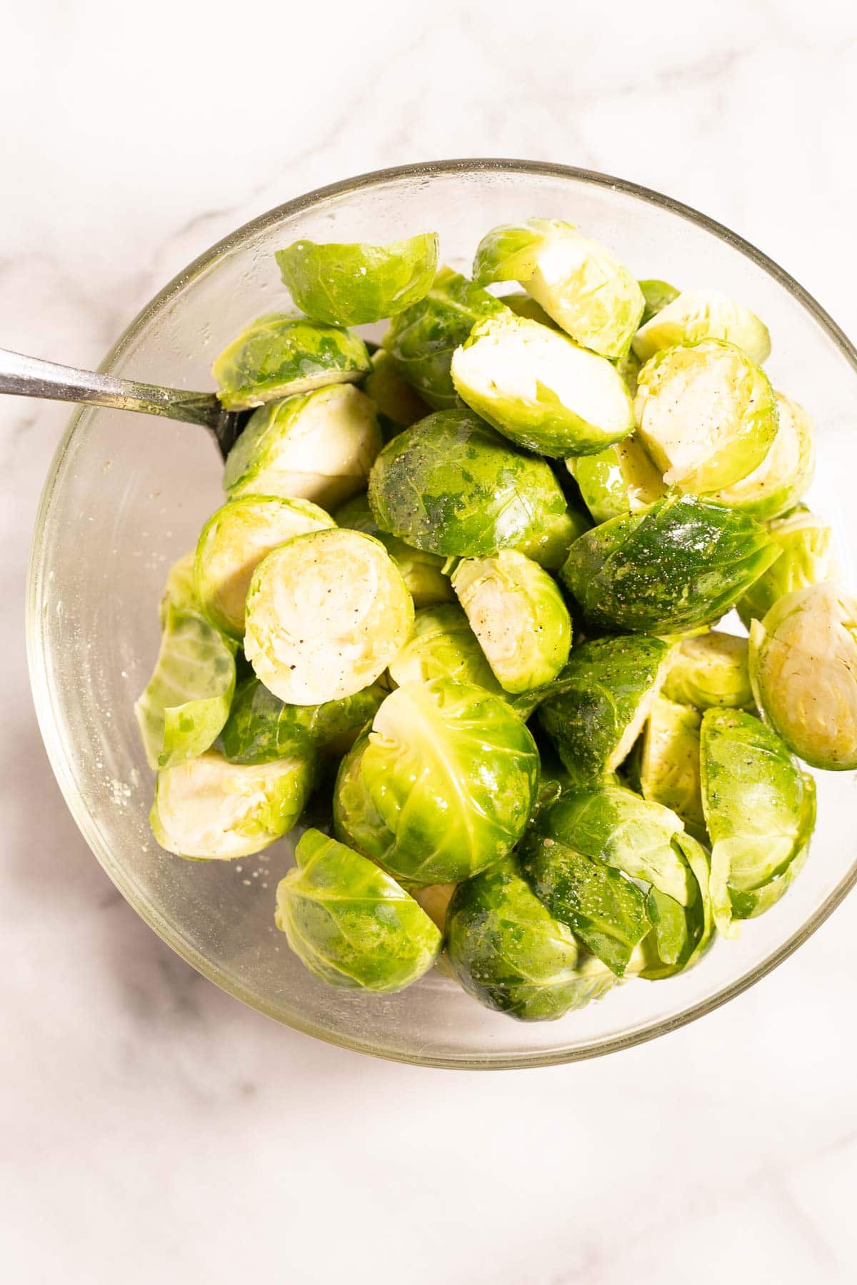 Sliced brussels sprouts in bowl.