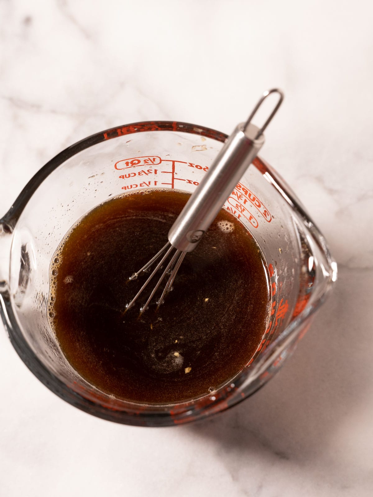 Stir fry sauce in measuring cup.
