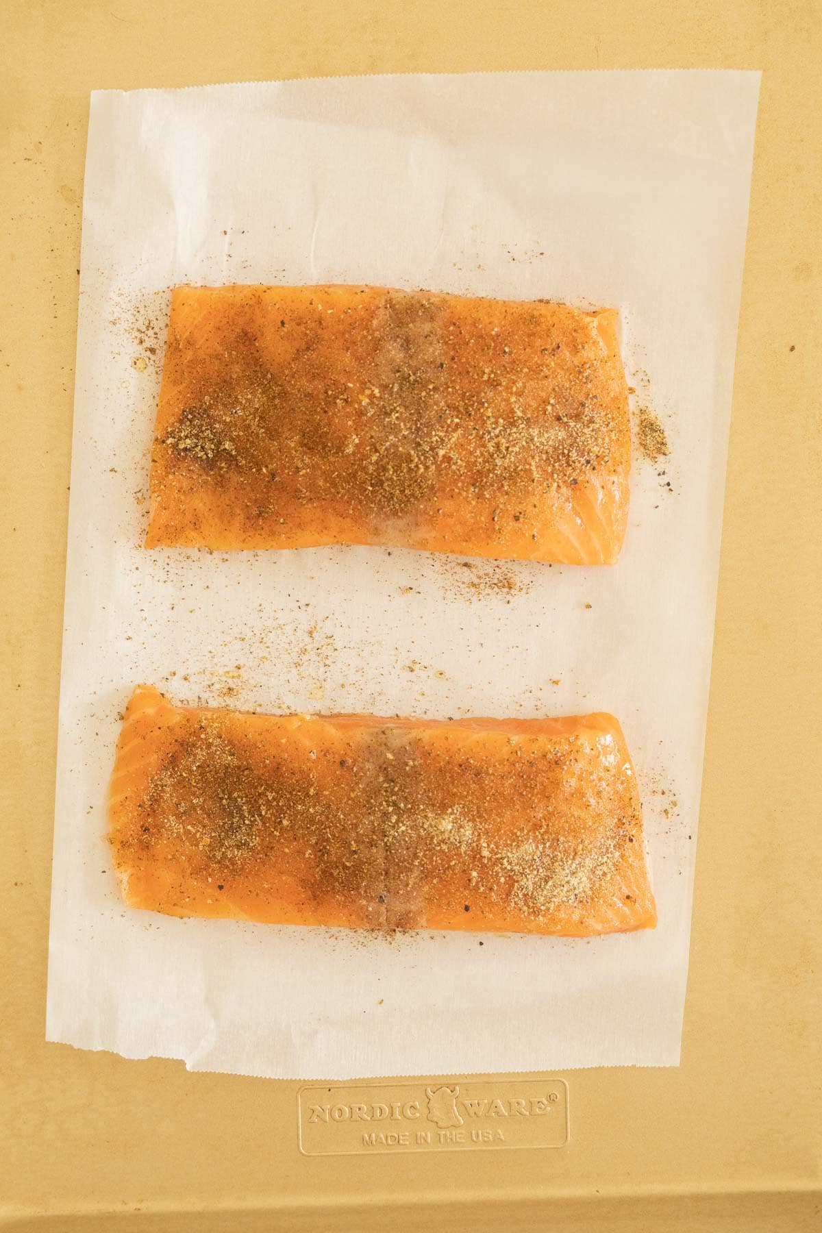 Blackened seasoned salmon fillets.