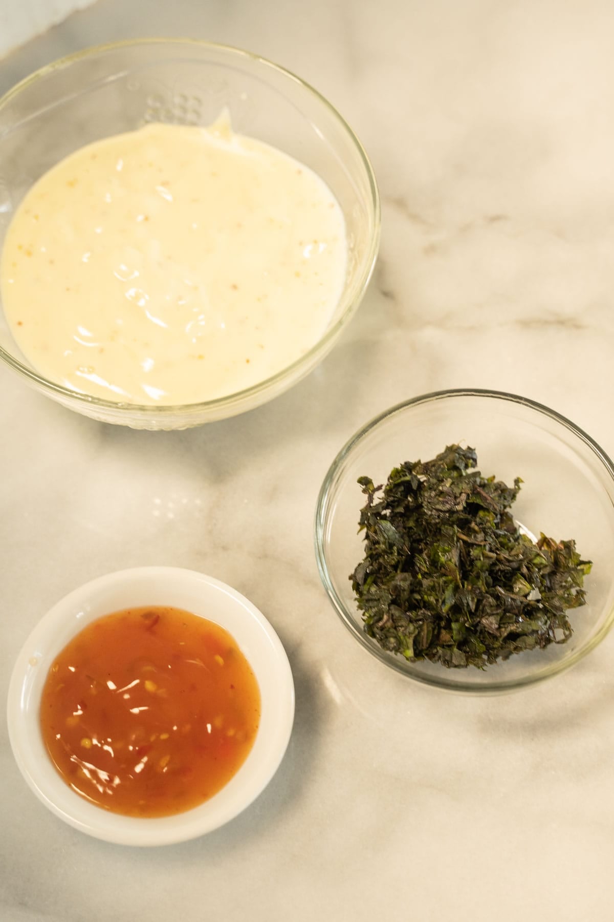 garlic aioli, sweet chili sauce, chopped basil.