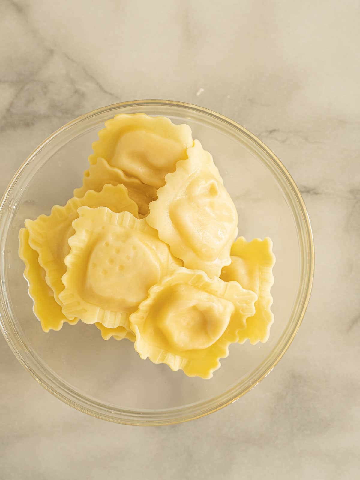 Lobster ravioli in bowl.