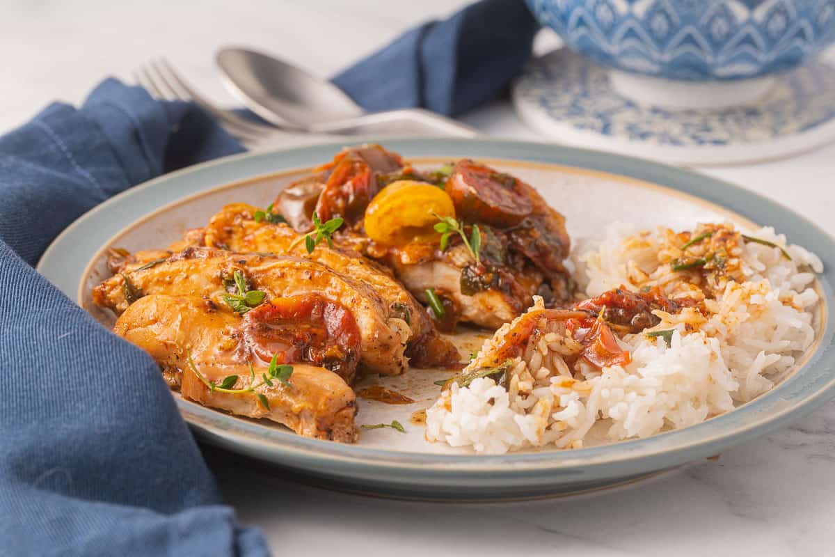 Pan roasted chicken thighs with burst tomatoes