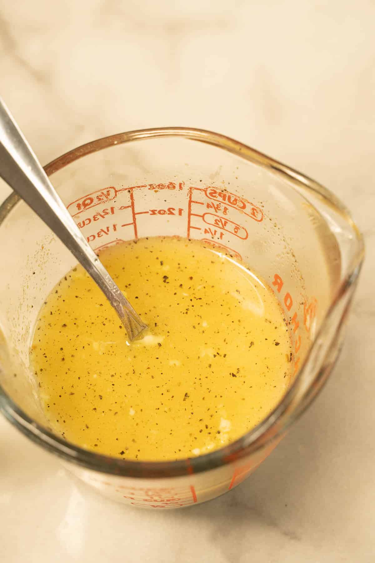 Francaise sauce in measuring cup.