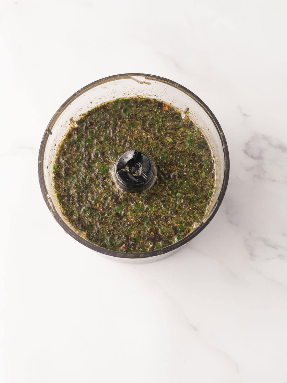 Basil chicken marinade in mini food processor.