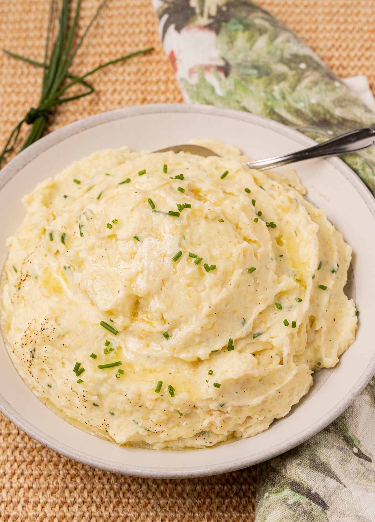 Sour Cream and chives mashed potatoes in bowl.