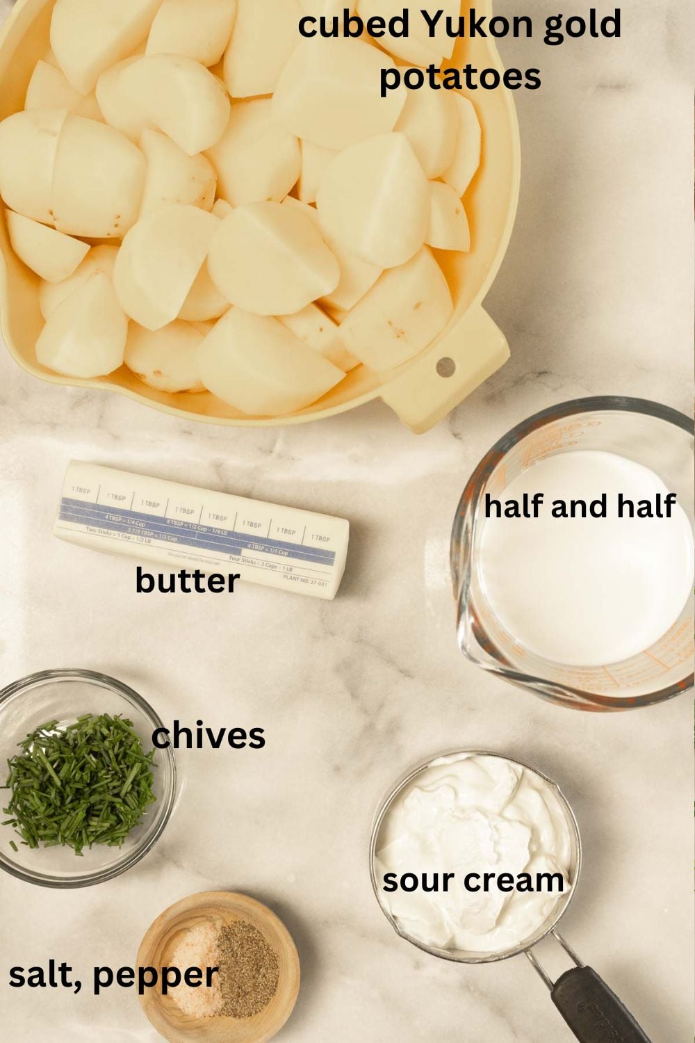 Yukon potatoes, sour cream, half and half, salt, pepper, chives, butter.