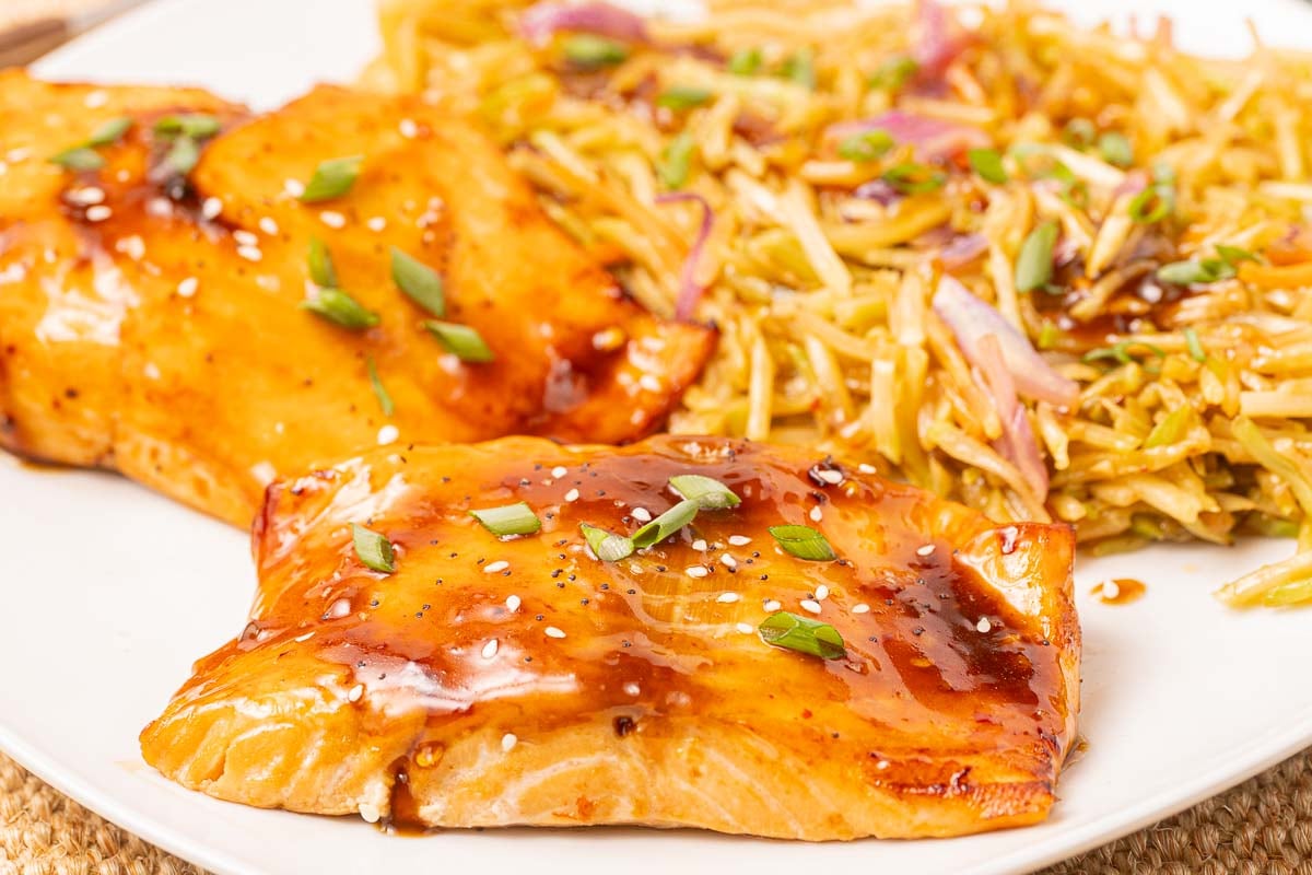 Air Fryer Teriyaki Salmon fillets with teriyaki broccoli slaw.