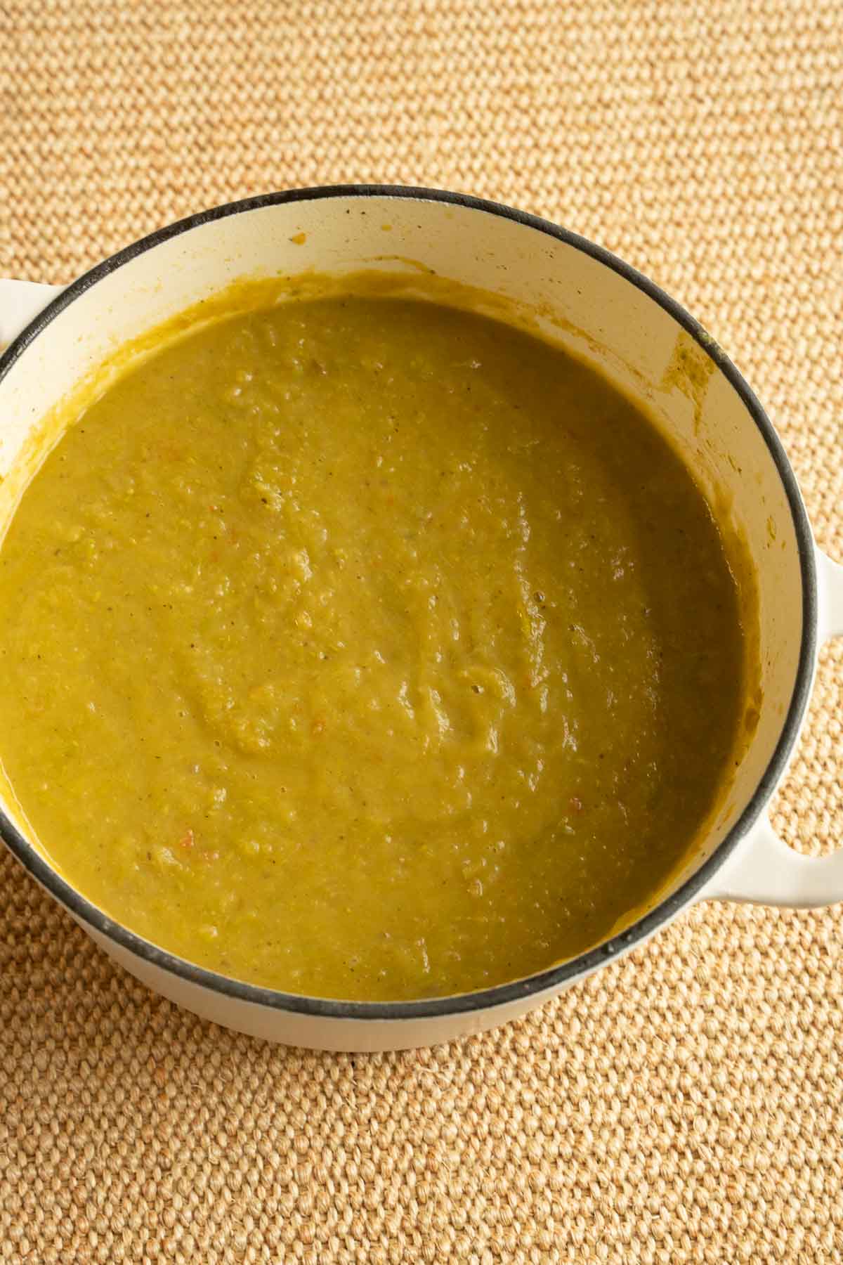 Pureed asparagus and potato soup in large pot.