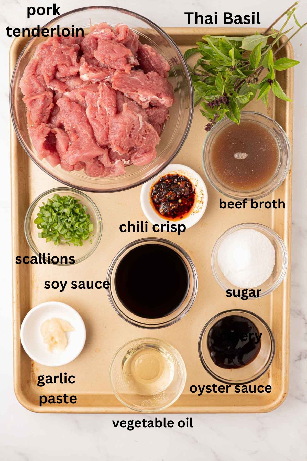 Pork tenderloin, thai basil, soy sauce, sugar, scallions, rice vinegar, chili crisp.