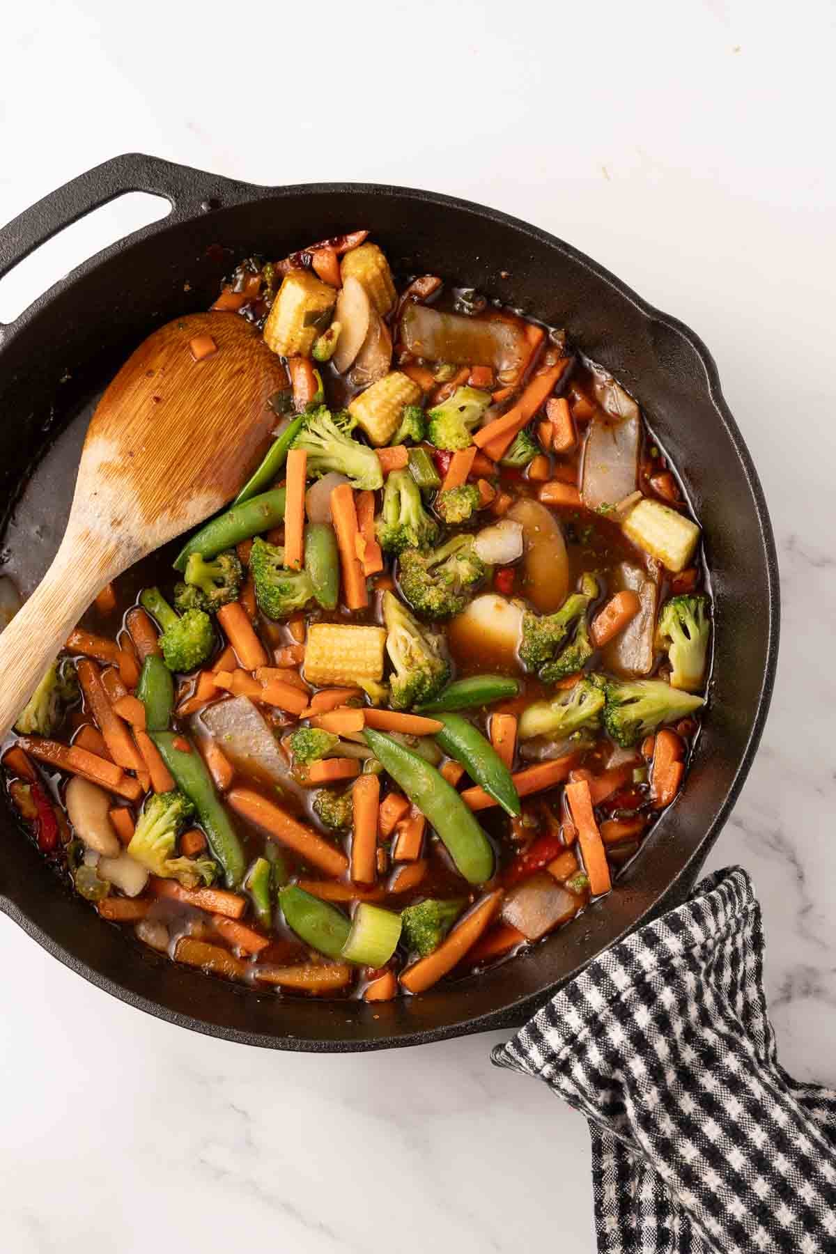 Thai Basil Pork in cast iron skillet.