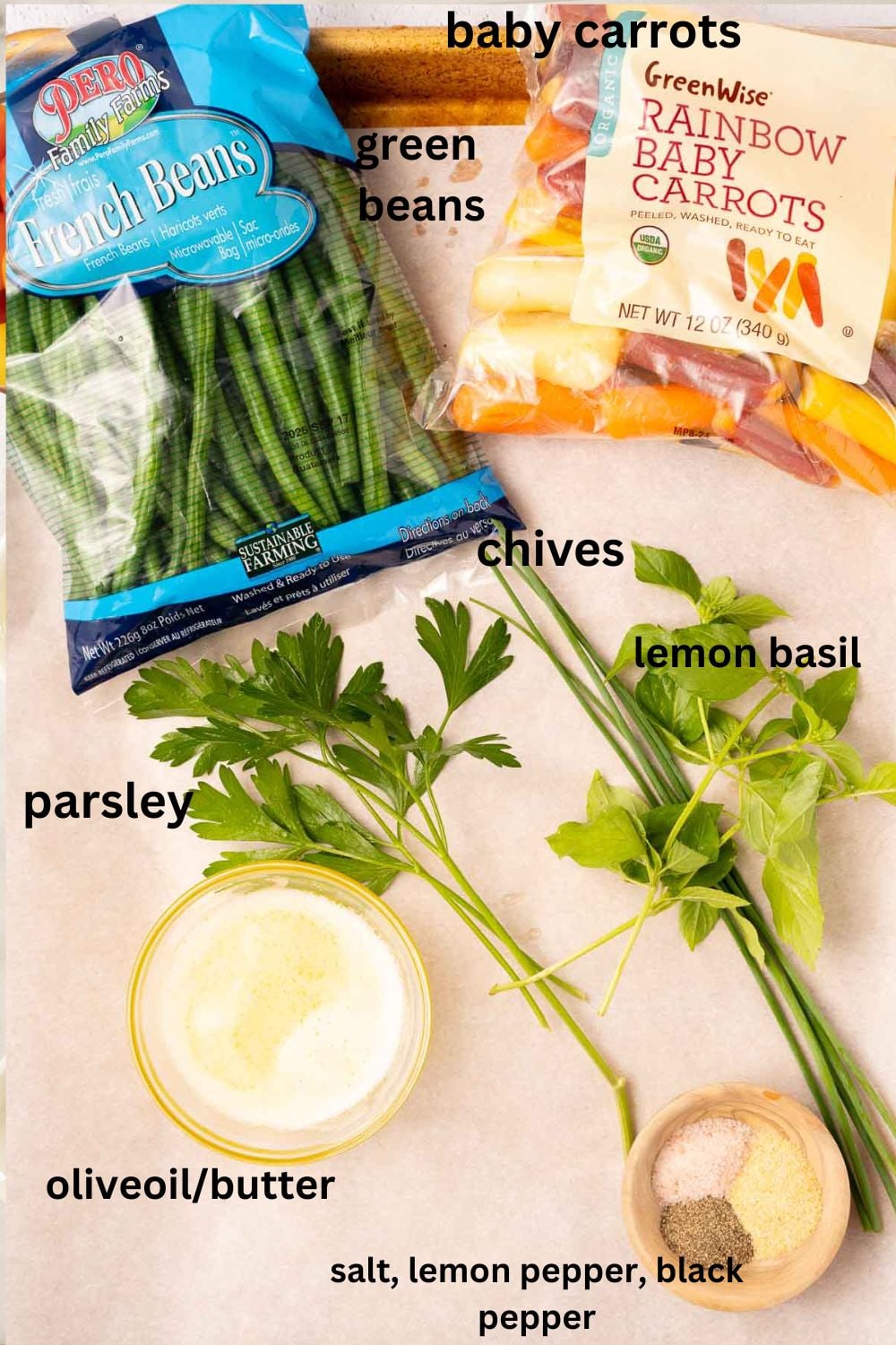 Green beans, baby carrots, butter, olive oil, salt, pepper, lemon pepper, parsley, chives, lemon basil herbs.