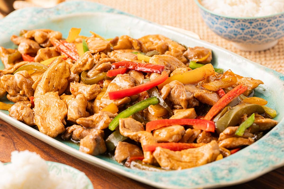 Chicken and Pepper Stir Fry on green platter.