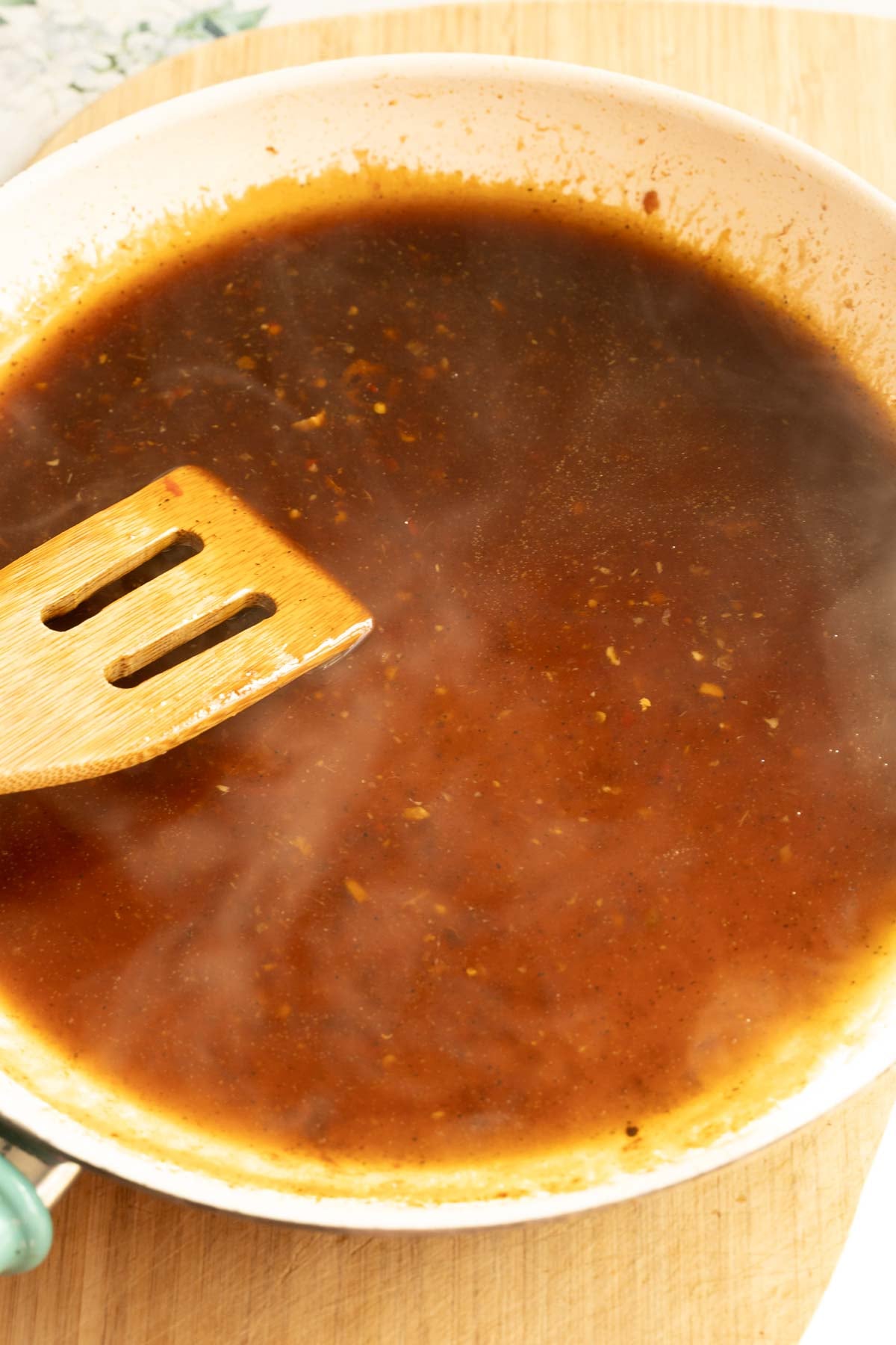 Simmering sauce in skillet.