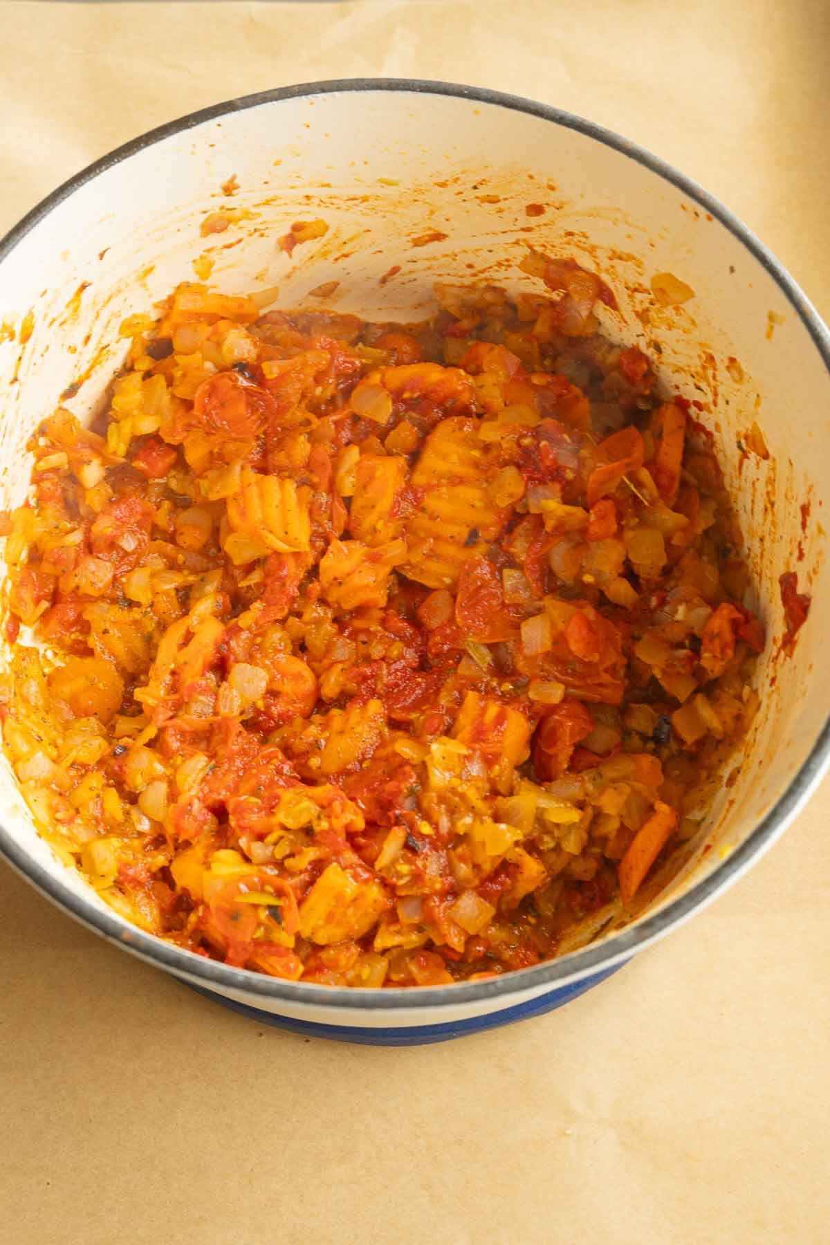 Ground sausage and chopped vegetables in large pot.