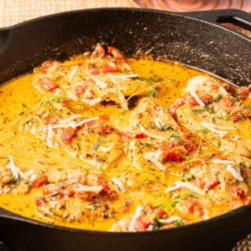 Marry me chicken in creamy sauce without sun dried tomatoes in skillet.