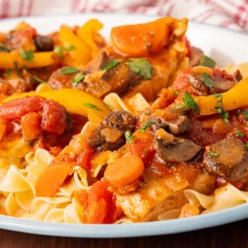 Platter of chicken breast cacciatore.